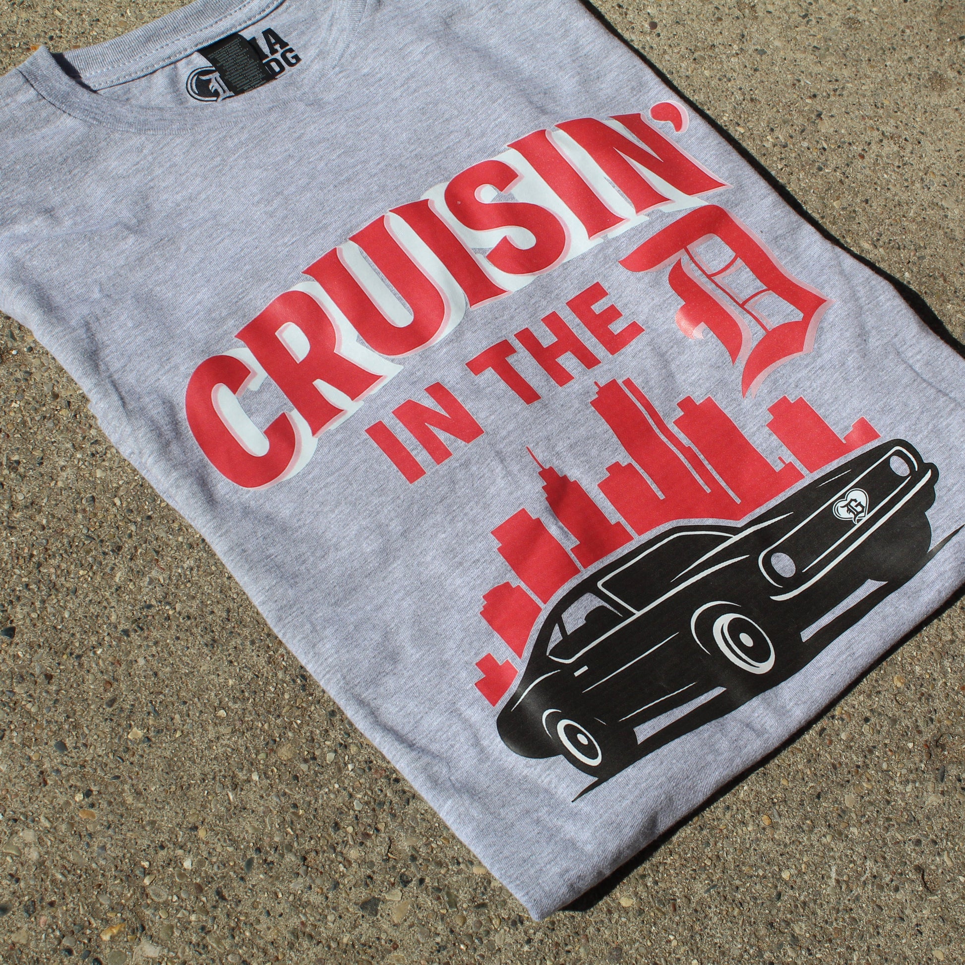 Left view of grey “Cruisin’ in the D” unisex T-shirt by I’m a Detroit Girl Clothing.