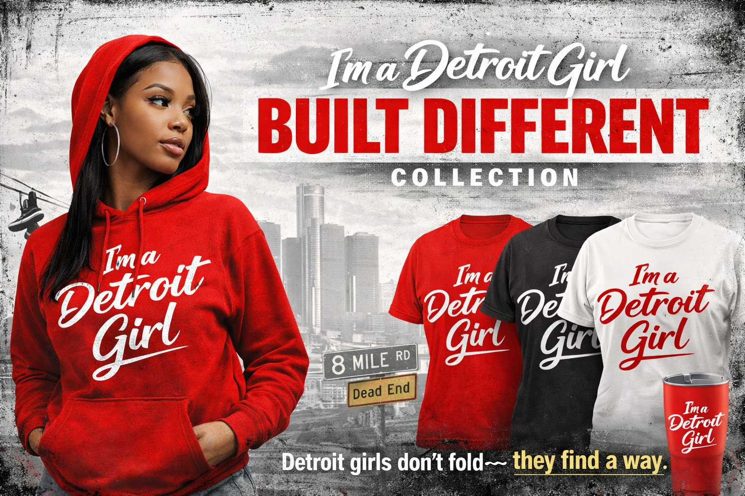 Person wearing a red hoodie with 'I'm a Detroit Girl' text, surrounded by matching t-shirts and a cup on a cityscape background.