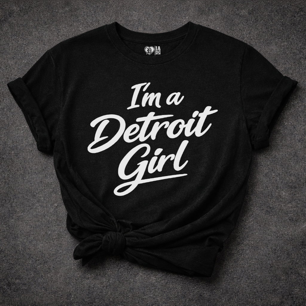 Black t-shirt with 'I'm a Detroit Girl' text on a dark gray background
