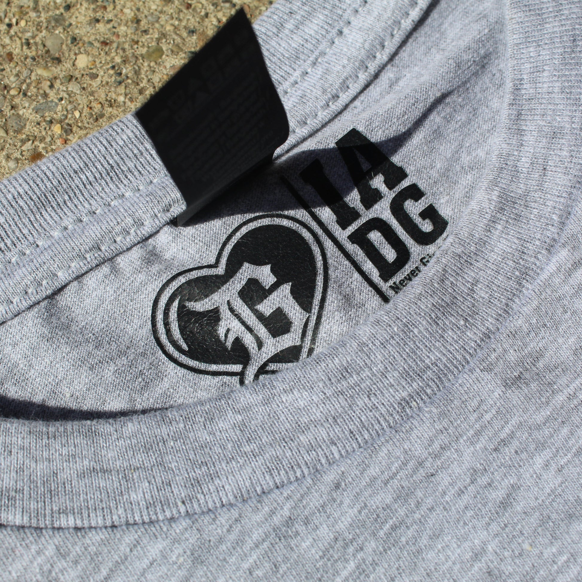 Neck Tag view of grey “Cruisin’ in the D” unisex T-shirt by I’m a Detroit Girl Clothing.